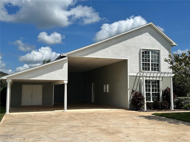 view of front of house featuring a carport