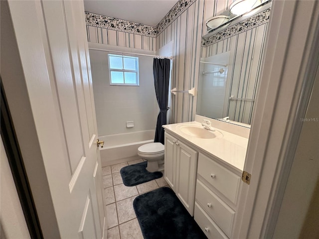 full bathroom with shower / bath combo, tile patterned flooring, vanity, and toilet