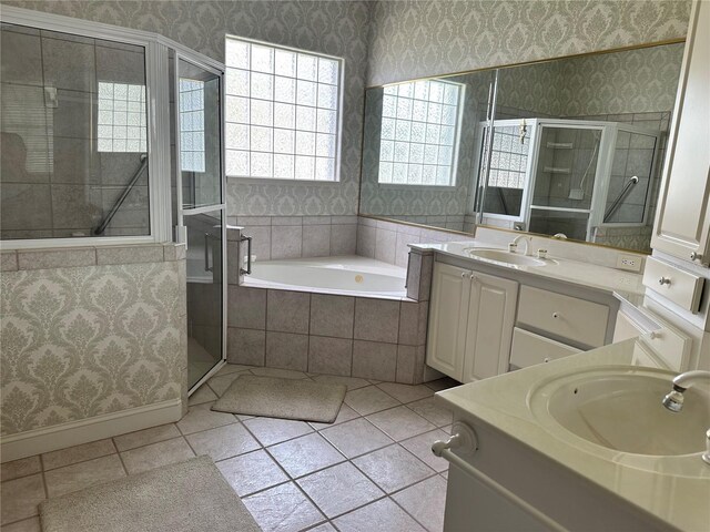 bathroom with vanity, plus walk in shower, and tile patterned floors