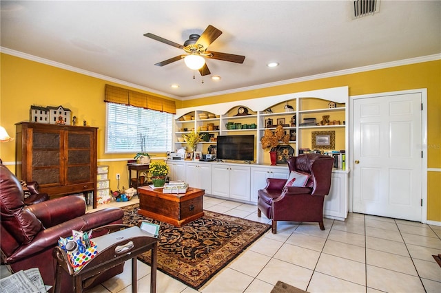 living room with built in features, ceiling fan, crown molding, and light tile patterned flooring