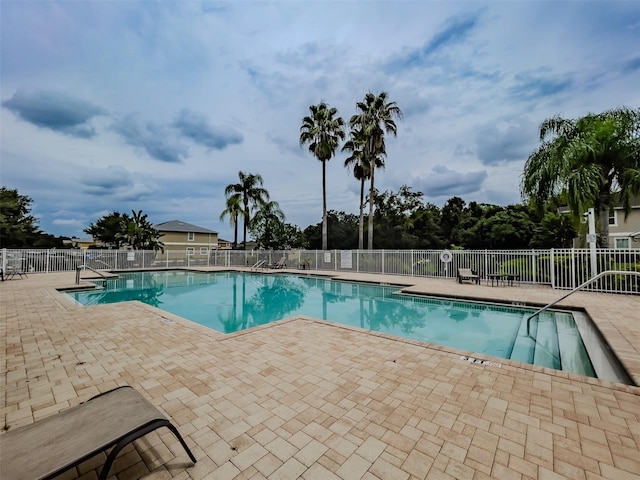 view of pool featuring a patio area