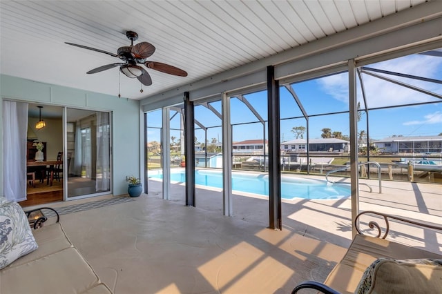 view of pool featuring ceiling fan