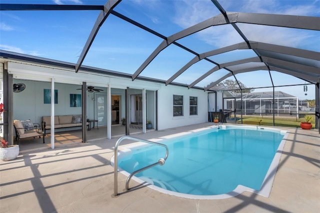 view of pool featuring a patio, a lanai, an outdoor hangout area, and ceiling fan