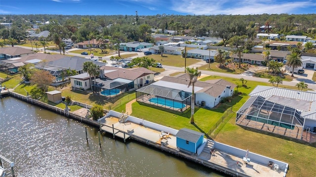 bird's eye view with a water view