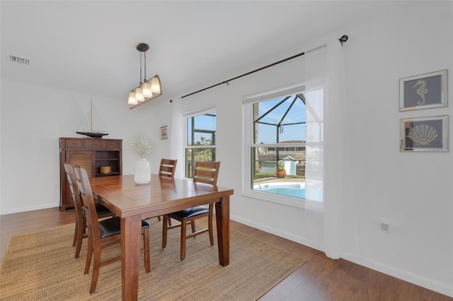 dining area featuring hardwood / wood-style flooring