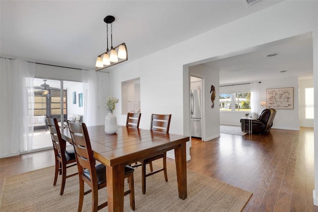 dining room with wood-type flooring