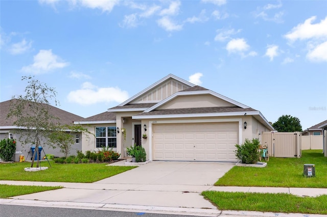 view of front facade with a front lawn and a garage