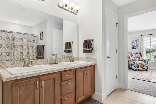 bathroom with vanity and tile patterned flooring