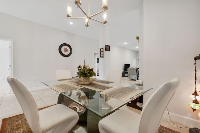 dining area with a chandelier and light tile patterned floors