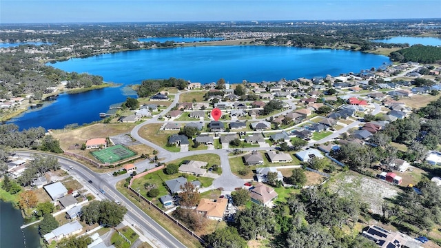 drone / aerial view with a water view