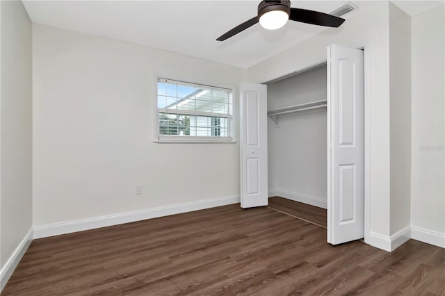 4618 Crestview Ln, Lakeland, FL 33813 - unfurnished bedroom with dark wood-type flooring, baseboards, a closet, and a ceiling fan