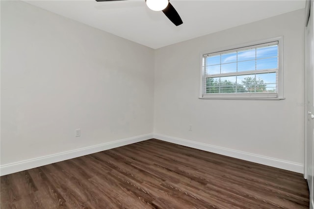 4618 Crestview Ln, Lakeland, FL 33813 - spare room with dark wood-style flooring, baseboards, and ceiling fan