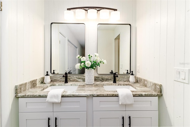 4618 Crestview Ln, Lakeland, FL 33813 - bathroom with double vanity and wooden walls