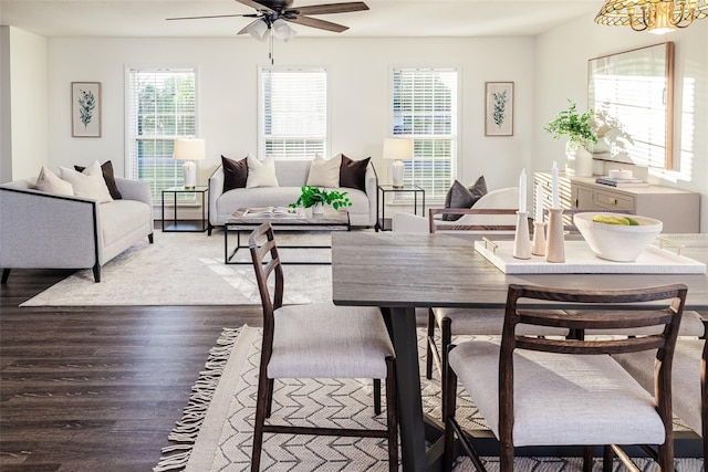 4618 Crestview Ln, Lakeland, FL 33813 - dining space featuring wood finished floors, a ceiling fan, and a chandelier