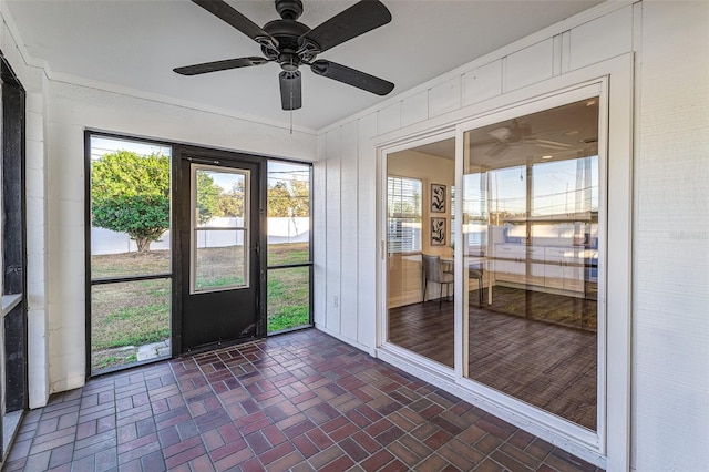 4618 Crestview Ln, Lakeland, FL 33813 - unfurnished sunroom featuring a ceiling fan and plenty of natural light