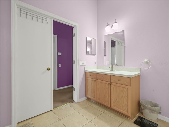 bathroom with vanity and tile patterned flooring