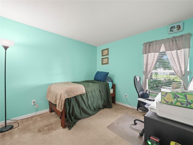 bedroom featuring light carpet