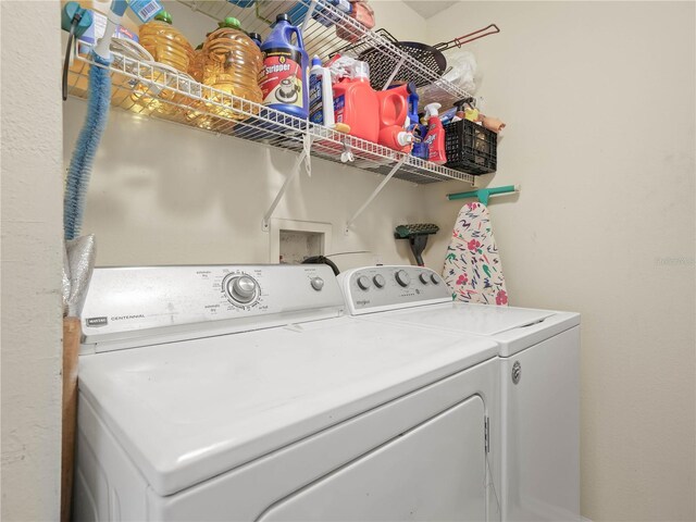 washroom featuring independent washer and dryer