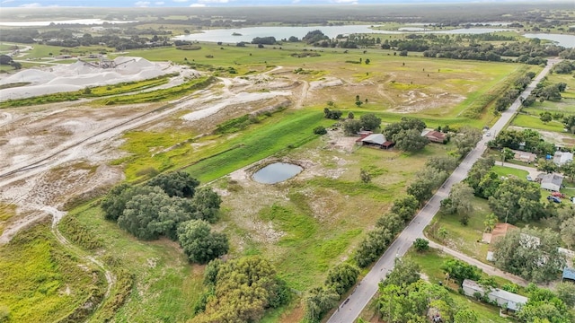 bird's eye view featuring a water view and a rural view