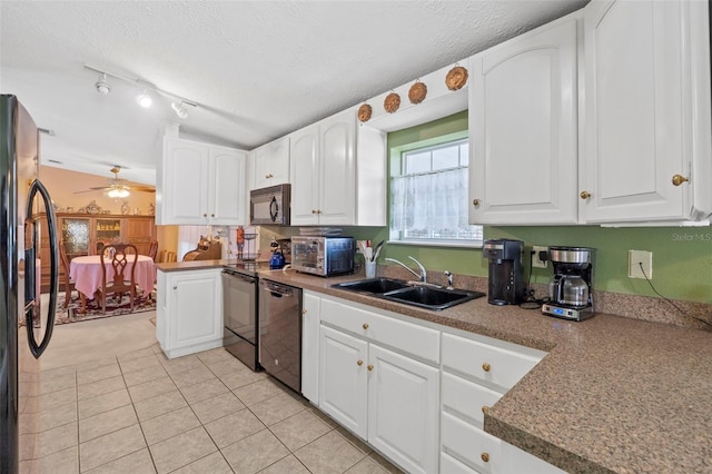 kitchen featuring black appliances, ceiling fan, white cabinetry, and sink