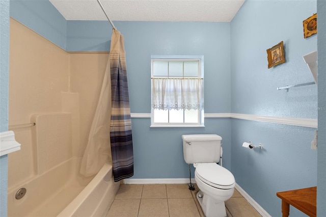 bathroom with shower / bathtub combination with curtain, tile patterned flooring, a textured ceiling, and toilet