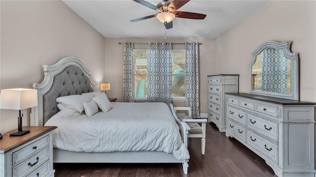 bedroom with ceiling fan and dark hardwood / wood-style floors