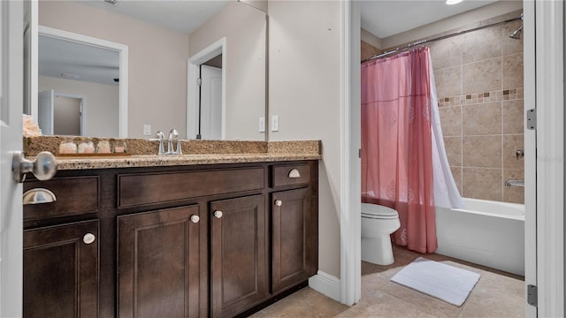 full bathroom featuring tile patterned flooring, vanity, toilet, and shower / bathtub combination with curtain