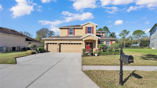 front of property with a front yard and a garage