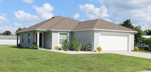 ranch-style home with a garage and a front lawn