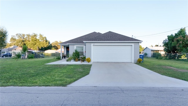 single story home with a front yard and a garage