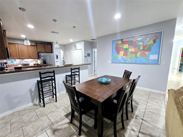 dining room with light tile patterned floors