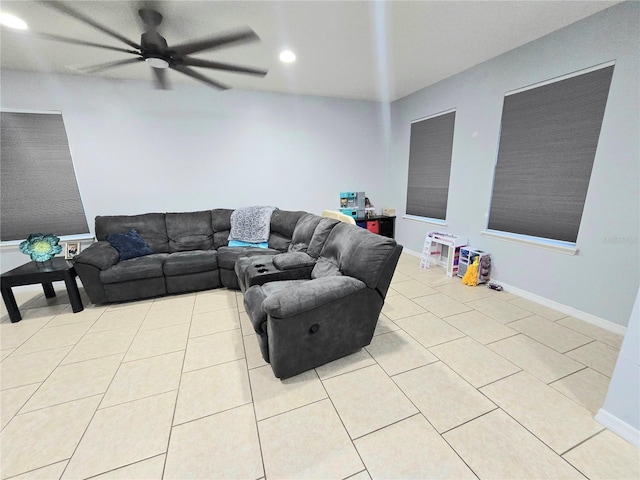 tiled living room featuring ceiling fan