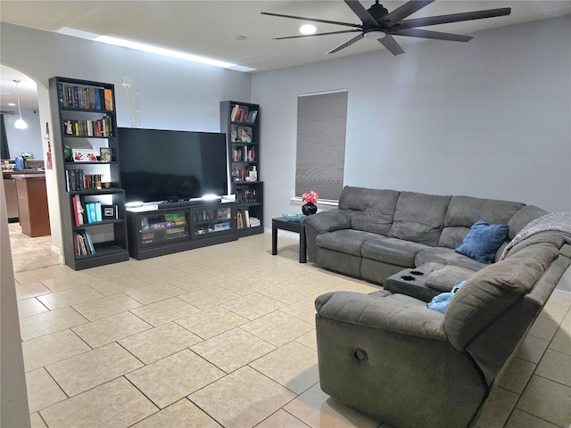 living room featuring ceiling fan and light tile patterned floors