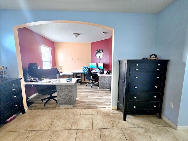 office area with light tile patterned flooring