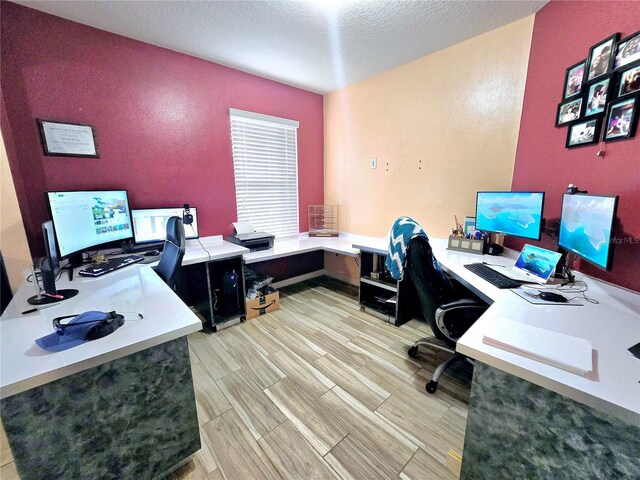 home office with a textured ceiling