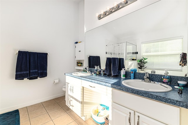 bathroom featuring an enclosed shower, lofted ceiling, tile patterned floors, vanity, and toilet