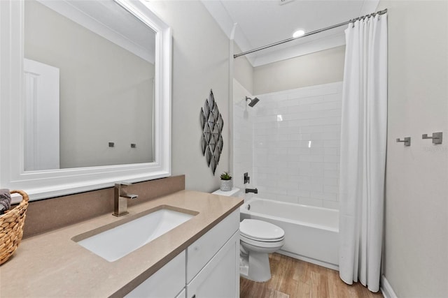 full bathroom with vanity, shower / bath combination with curtain, toilet, and hardwood / wood-style floors