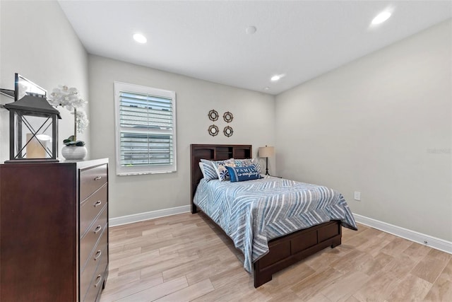 bedroom featuring light hardwood / wood-style floors