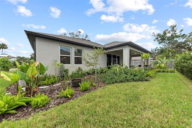 exterior space featuring a lawn