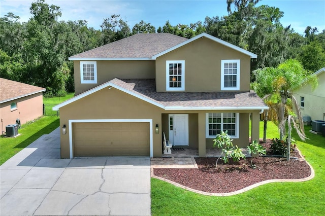 view of front of home with central AC unit and a front yard