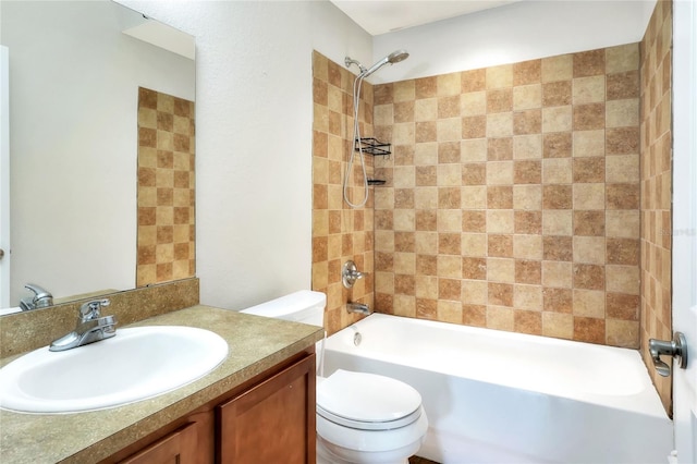 full bathroom with vanity, toilet, and tiled shower / bath