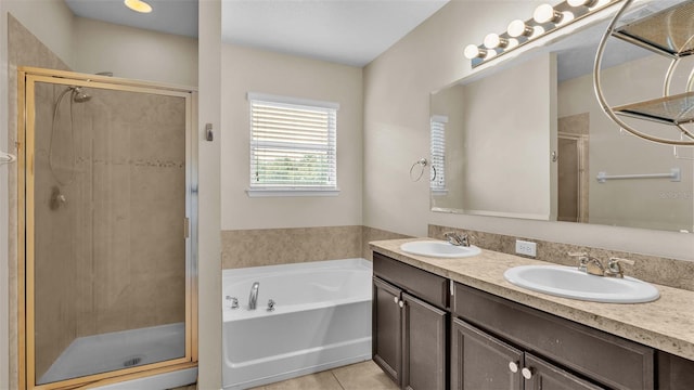 bathroom with vanity, plus walk in shower, and tile patterned floors