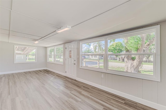 unfurnished room featuring light hardwood / wood-style floors