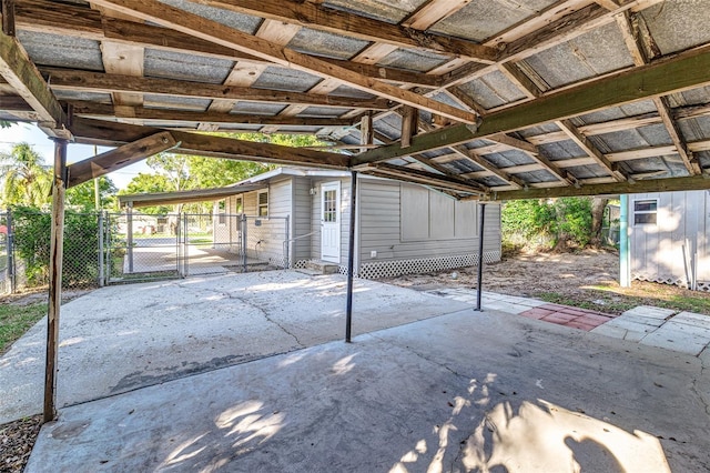 view of patio / terrace with a shed