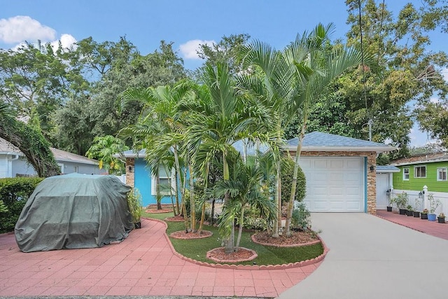 view of front of property with a garage