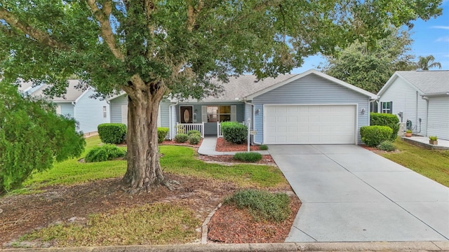 single story home with a garage and covered porch