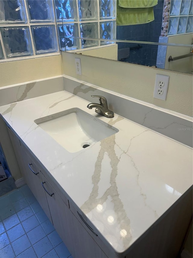 bathroom featuring vanity and tile patterned floors