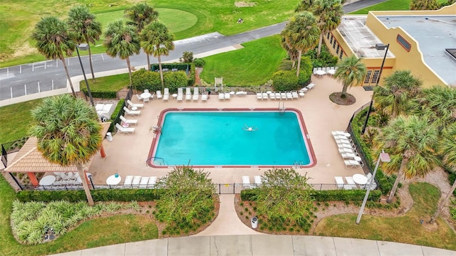 view of swimming pool with a patio area