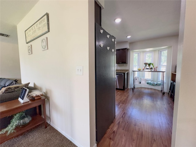 hallway with dark wood-type flooring