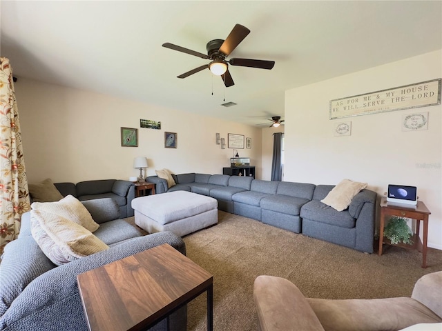 carpeted living room featuring ceiling fan